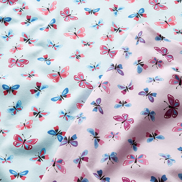 Baumwolljersey Schmetterlinge – pastellflieder | Reststück 110cm