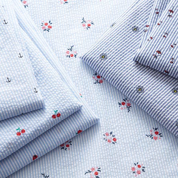 Seersucker Kirschen – weiss/hellblau | Reststück 50cm